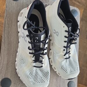 On Running White and Black Athletic Shoes with Breathable Design